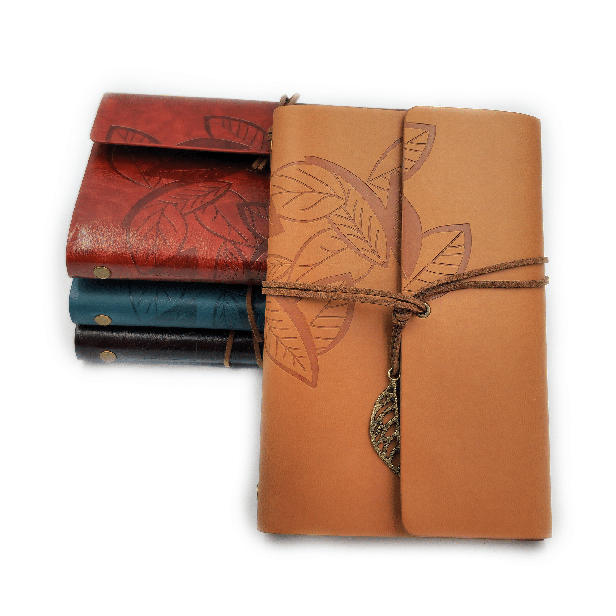 Feather Design Leather Journal  this journal comes with the ring filing system which means you can re-add paper to it once its finished.