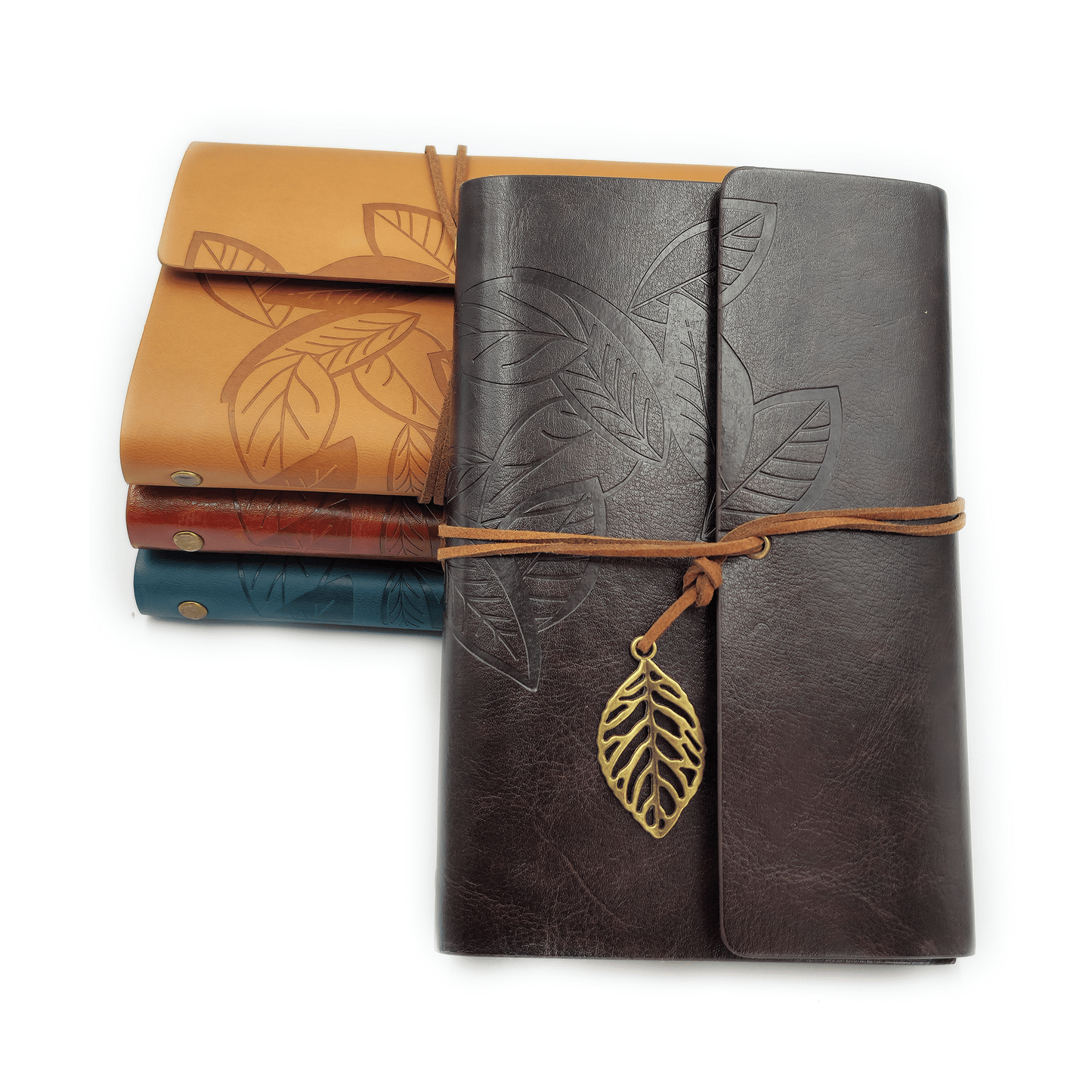 Feather Design Leather Journal  this journal comes with the ring filing system which means you can re-add paper to it once its finished.